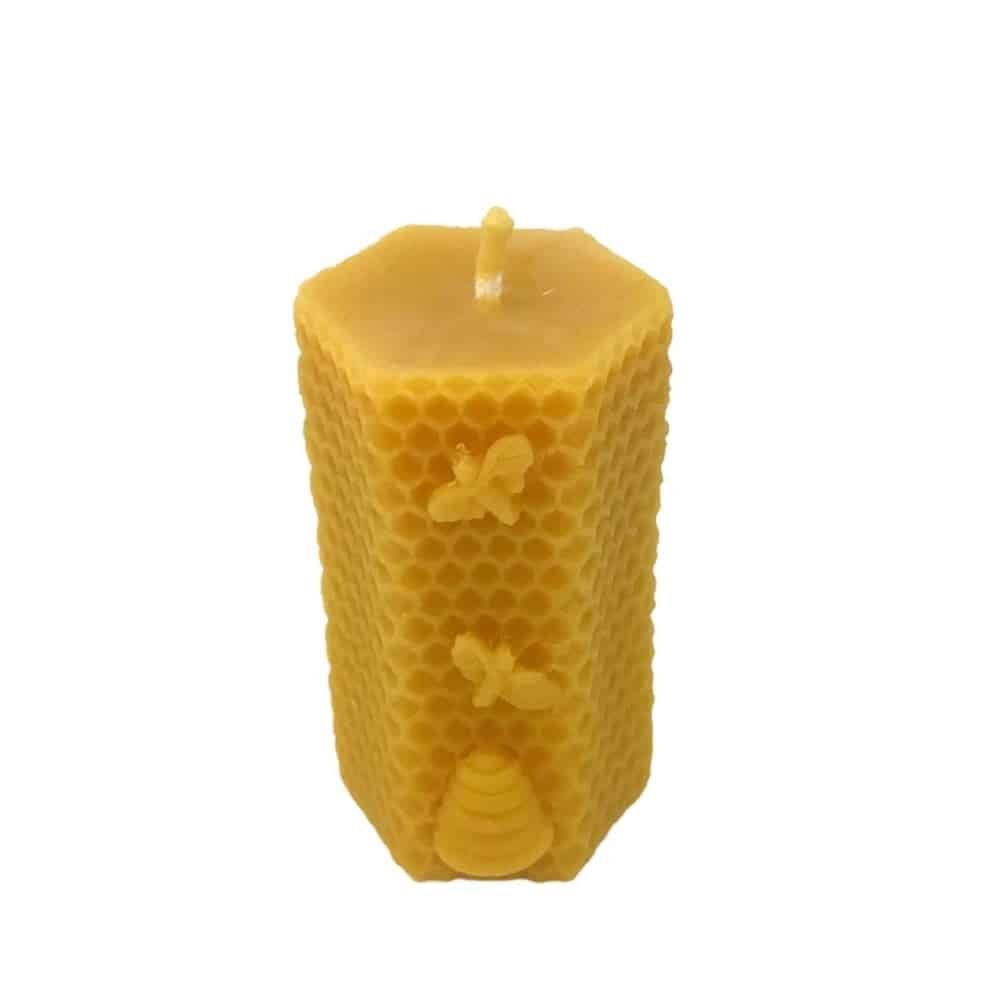 Honeycomb beeswax candle with bees